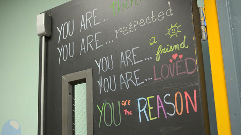 Blackboard with the writing you are respected... you are loved... on it